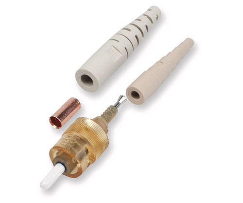 Disassembled components of an ST fiber optic connector laid out flat.