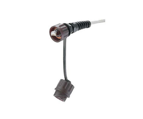 A shielded modular plug cable connector with a protective cap attached.