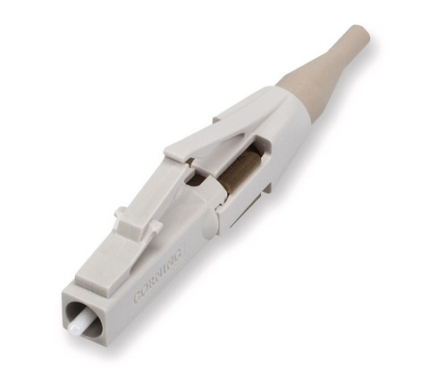 Corning LC fiber optic connector with a beige boot and white ferrule.