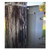 A light gray enclosure mounted to a wooden utility pole with metal strapping.
