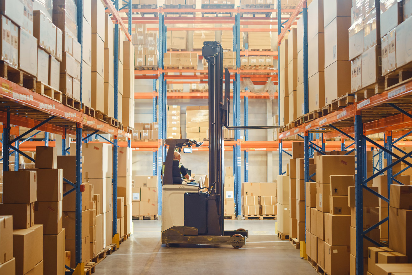Industrial Warehouse with Forklift Operator