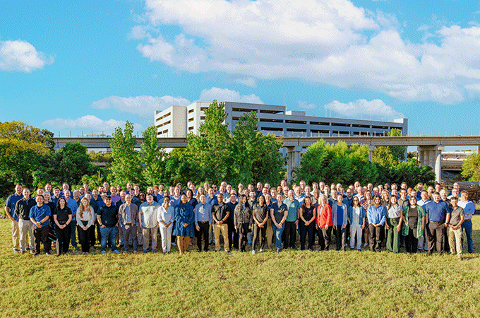 INS employees at annual meeting