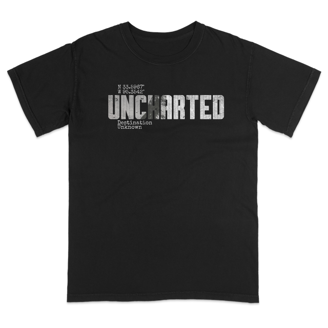 Dark garment-dyed Comfort Colors adult tee mockup showcasing inspirational Valley Youth Uncharted artwork across the front.