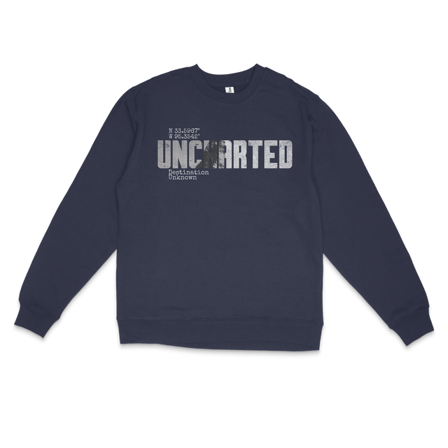 Relaxed-fit Storm Blue fleece crewneck sweatshirt mockup showcasing bold faith-based Uncharted chest print in rugged distressed white ink with motivational adventure phrases