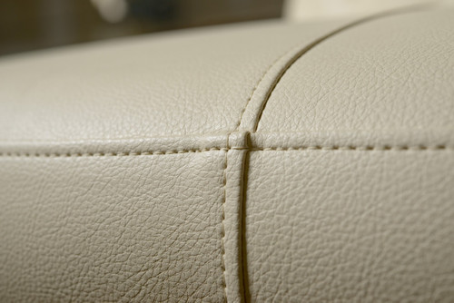 Cream Faux Leather Custom Borne Settee Round Sofa - Celebrity Furnishings