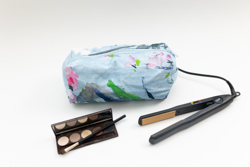 Spacious makeup bag with a light blue base and pink and green floral designs. Wonderful for gifts, vacation, travel, organization, and day-to-day use! Spacious makeup bag with a light blue base and pink and green floral designs. Wonderful for gifts, vacation, travel, organization, and day-to-day use!
