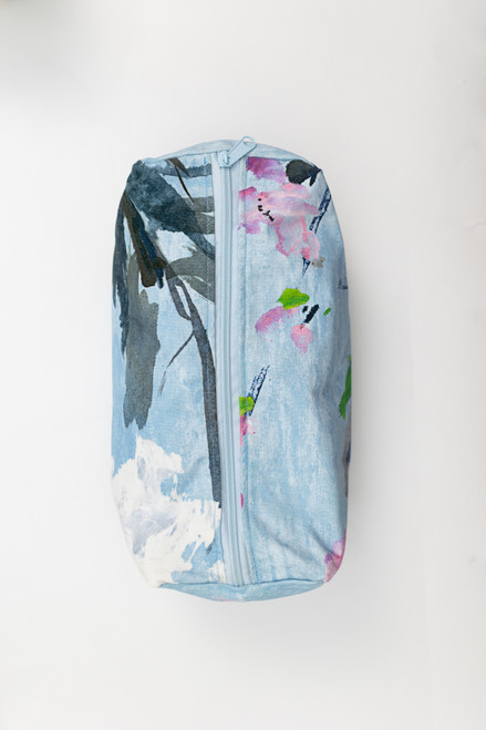 Spacious makeup bag with a light blue base and pink and green floral designs. Wonderful for gifts, vacation, travel, organization, and day-to-day use! Spacious makeup bag with a light blue base and pink and green floral designs. Wonderful for gifts, vacation, travel, organization, and day-to-day use!