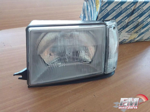 Headlight Left RHD fits Lancia Y10 7636706 Genuine View Front