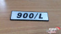 Emblem 900/L fits Fiat 127 4396642 Genuine View Front