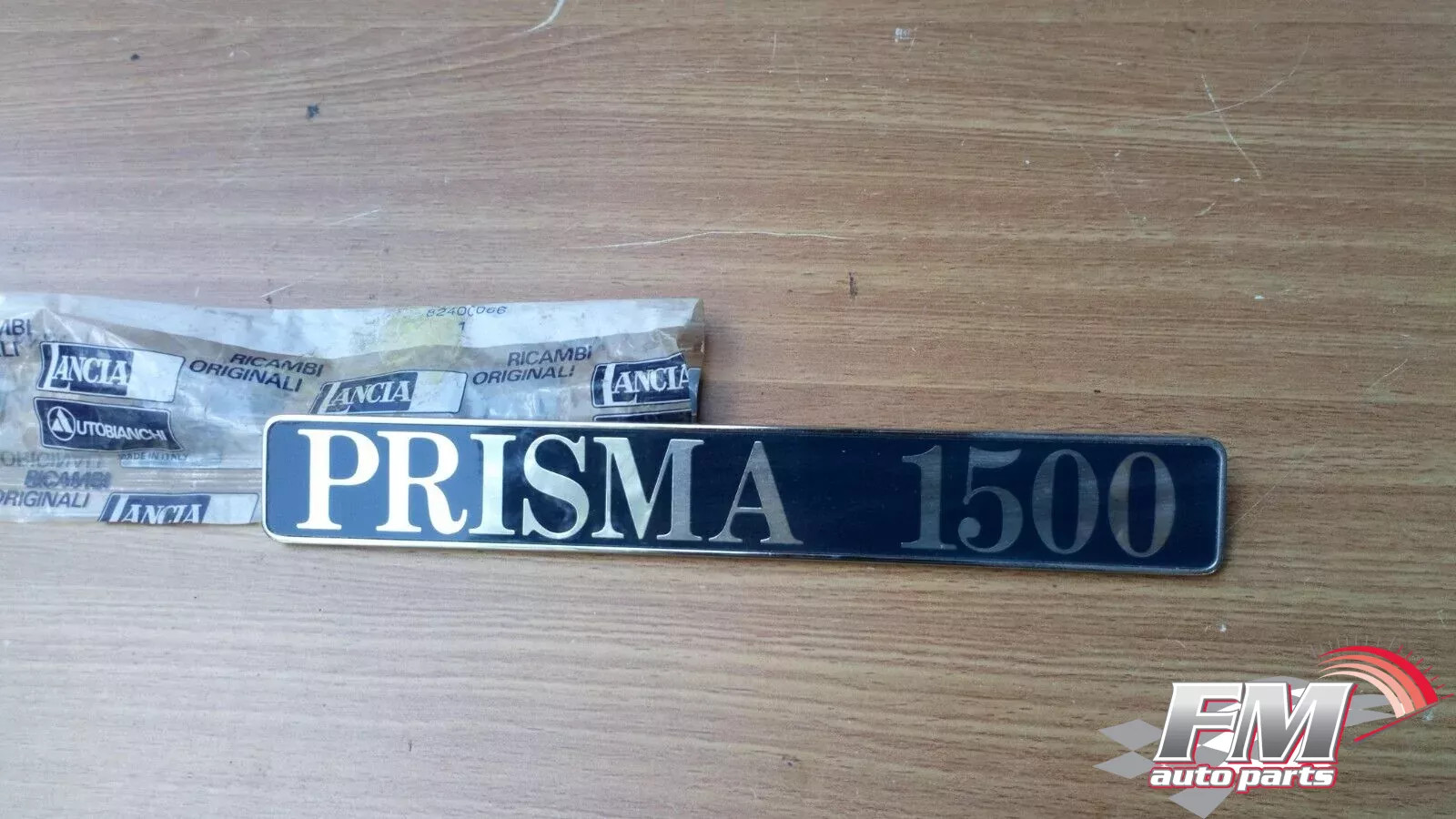 Emblem Lettering PRISMA 1500 fits Lancia Prisma 82400066 Genuine Emblem Lettering PRISMA 1500 fits Lancia Prisma 82400066 Genuine