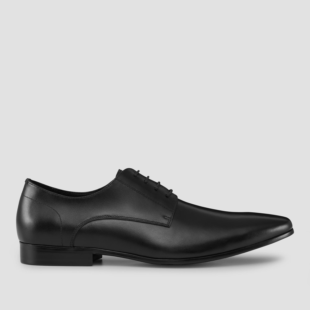 white and black dress shoes