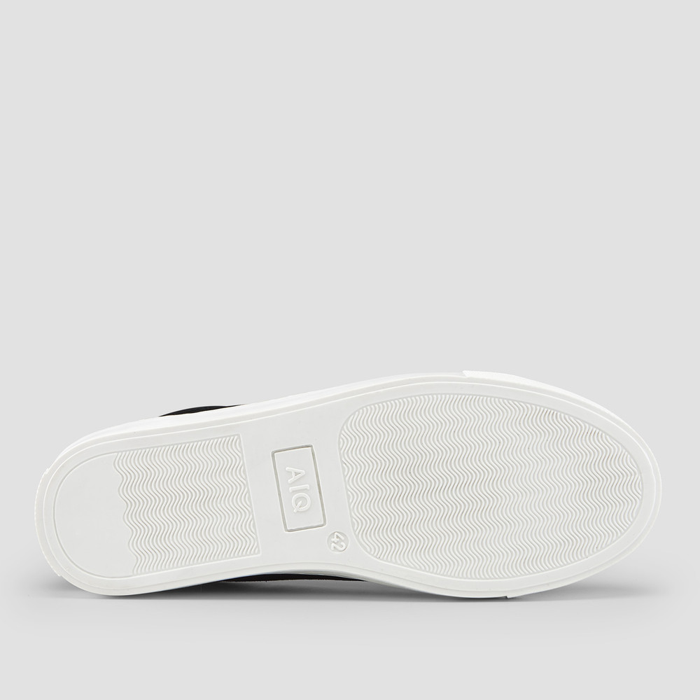 black sneakers that look like dress shoes