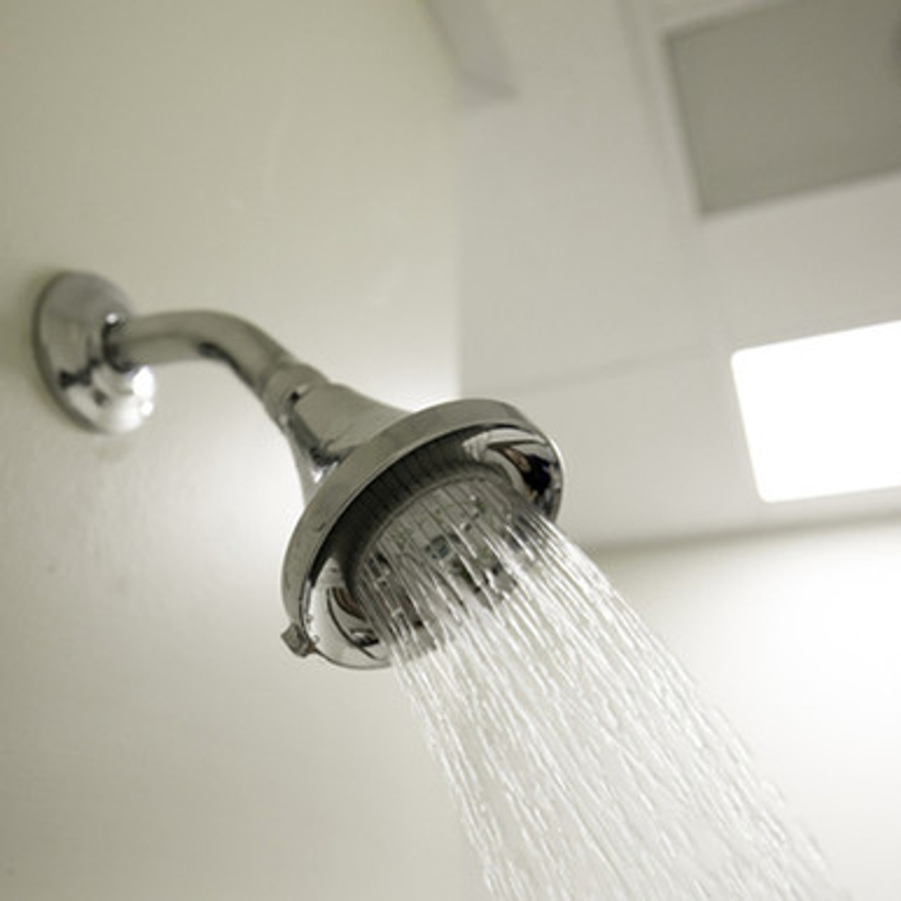 Showerhead on wall