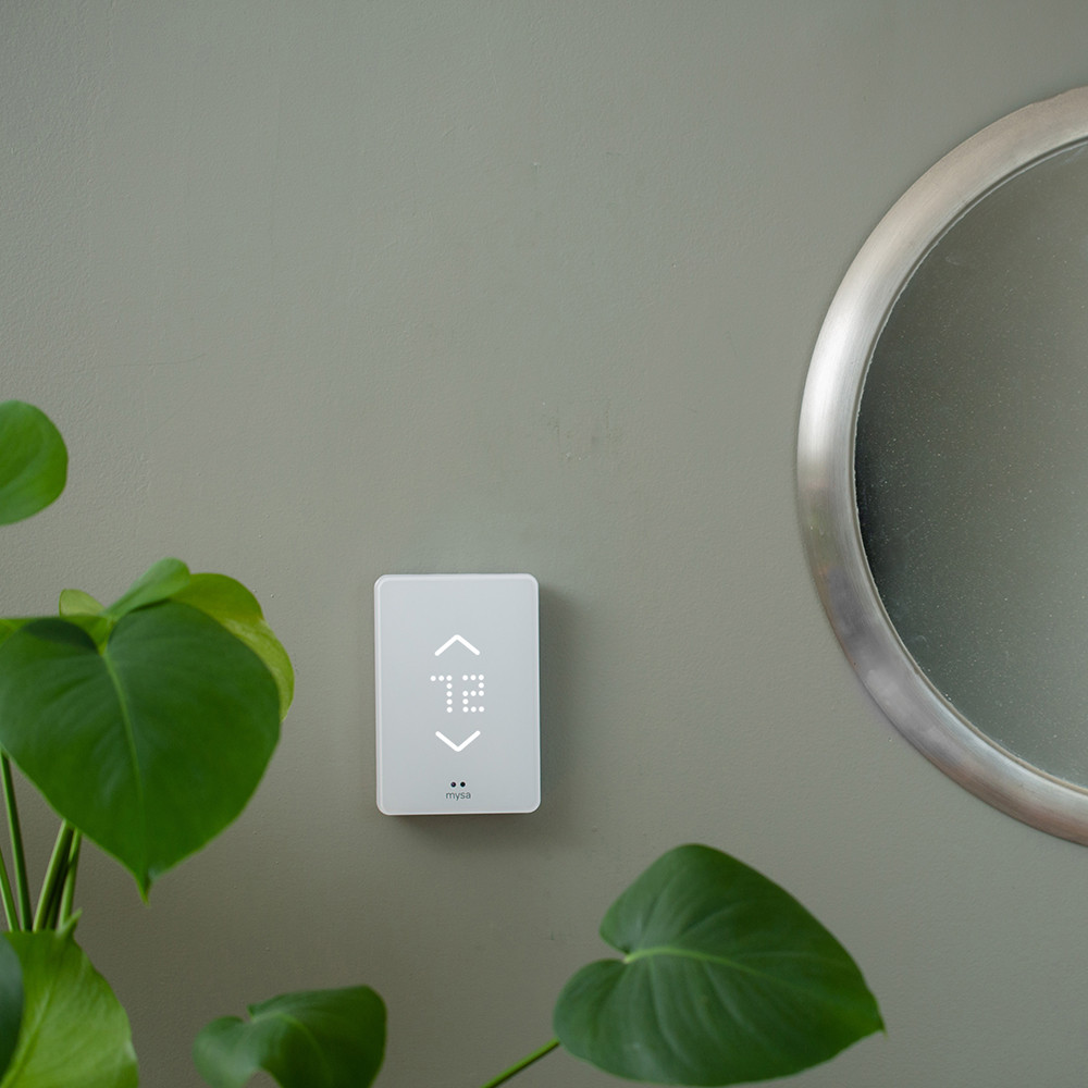 Mysa baseboard smart thermostat installed on wall