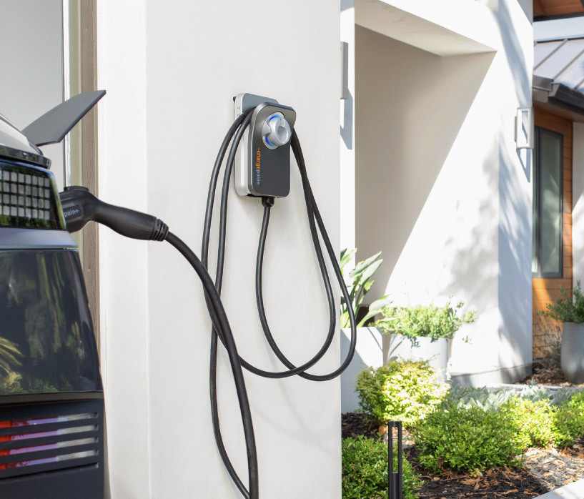 Chargepoint charger on the side of garage