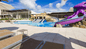 Water slides & loungers at Sonesta Maho Beach Resort in St. Maarten. 