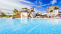 Water slides and large pool area at Sonesta Maho Beach Resort in St. Maarten. 