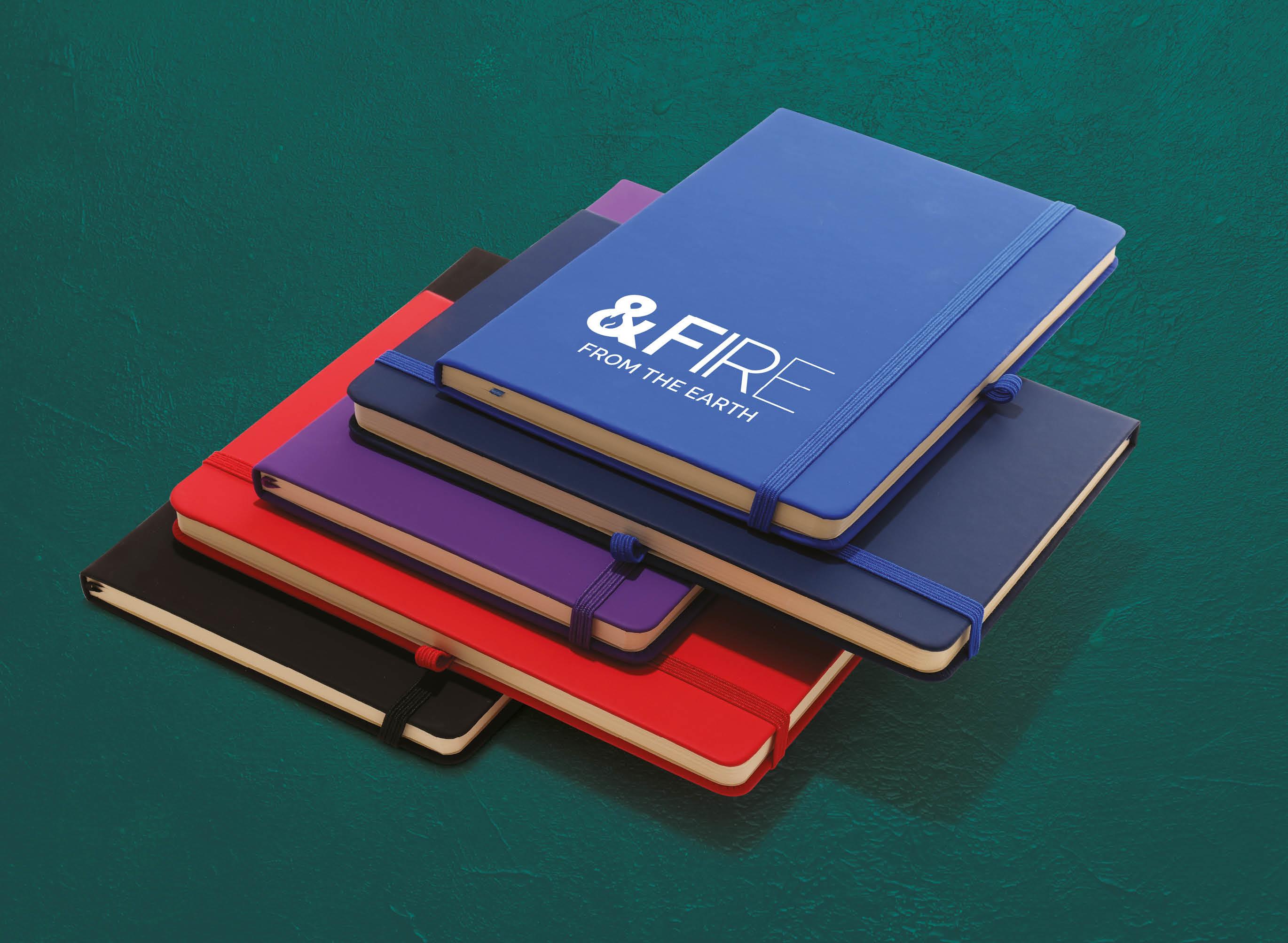 Stack of branded notebooks