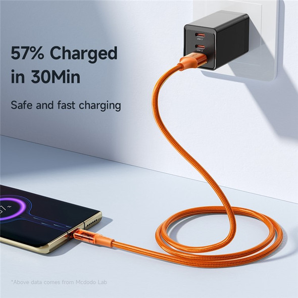 MCDODO CA-209 1.8m Amber Series 480Mbps Transparent Data Cord USB to Type-C 6A Max Charging Cable - Orange