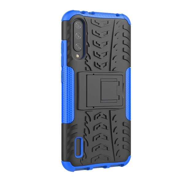 For Xiaomi Mi CC9e Tire Texture TPU + PC Shockproof Case with Holder(Blue)