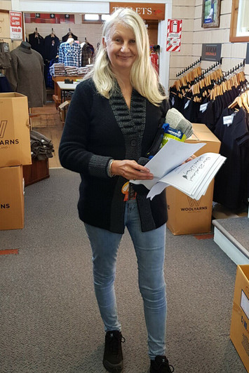 Julie, owner of NZ Natural Clothing picking orders in her new Feature Collar Jacket.
