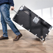 XL Rhino Indestructo Travel Trunk wheeling it away