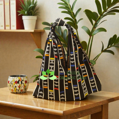 Paulie Heritage Chic Handbag
Every bag we create is a celebration of culture, creativity, and craftsmanship.
We blend vibrant African fabrics with thoughtful, handcrafted design to bring you

handbags that are not only stylish but truly meaningful.

What Makes Our Handbags Special
Handmade with care: Every stitch is crafted by us, not machines.
Authentic African fabrics: Bold, colorful, and full of cultural meaning.
 