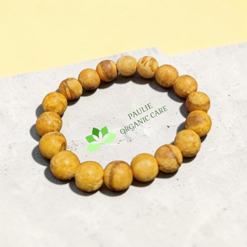PAULIE PALO SANTO WOOD BRACELET

Cleansing • Grounding • Peace • Positive Intention

Palo Santo, meaning “Holy Wood,” has traditionally been used in spiritual and ceremonial practices.

Wearing a Palo Santo bracelet can serve as a personal reminder to stay grounded, intentional, and connected to your spiritual practice.

Spiritual Benefits & Traditional Associations

Spiritual cleansing : traditionally used in purification and cleansing rituals.
Protection intention: worn as a symbolic reminder to protect your peace and maintain healthy energetic boundaries.
Grounding : encourages moments of calm, presence, and reconnection with yourself.
Peace & emotional balance : its spiritual symbolism can complement meditation, prayer, and quiet reflection.
Meditation & spiritual focus :the beads can be held or touched during affirmations, prayer, or intention-setting.
Positive intention :wear it as a daily reminder of the energy, mindset, and values you want to cultivate.
AFFIRMATION:
“I release what weighs me down. I protect my peace. I walk grounded, clear, and open to positive possibilities.”

PAULIE ORGANIC CARE — Wear Your Intention. Carry Your Peace.