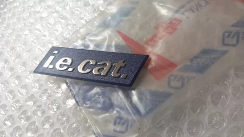 Emblem i.e. cat. fits Fiat Tempra 7704733 Genuine View Front