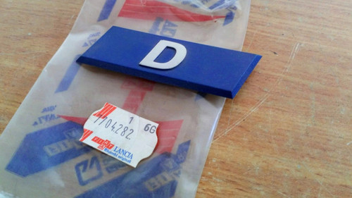 Emblem D fits Fiat Uno 7704282 Genuine View Front