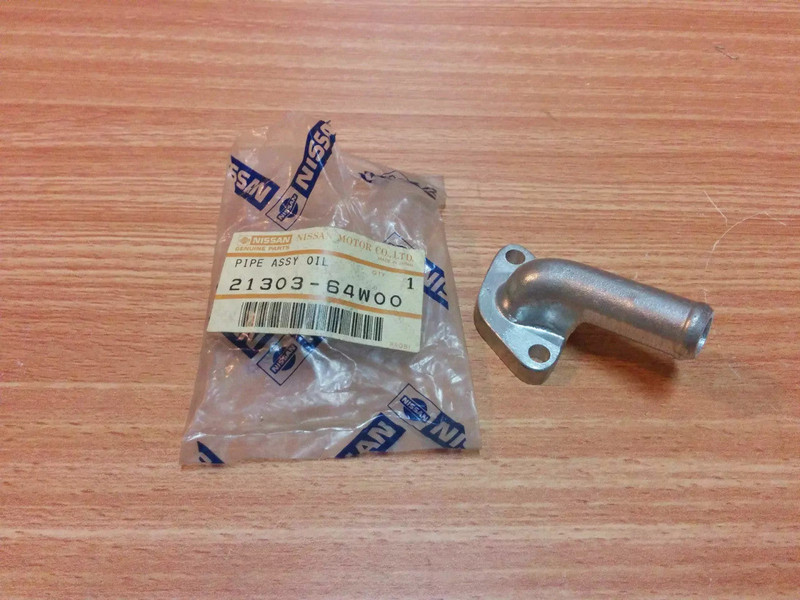 Oil Cooler Pipe fits Nissan Datsun Pickup Truck 720 D21 SD23 SD25 Genuine 21303-64W00 View Front