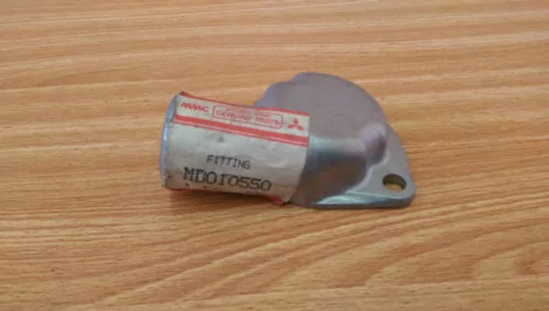Water Elbow Outlet Thermostat Cover fits Mitsubishi Colt 1100 11 MD010550 View Front