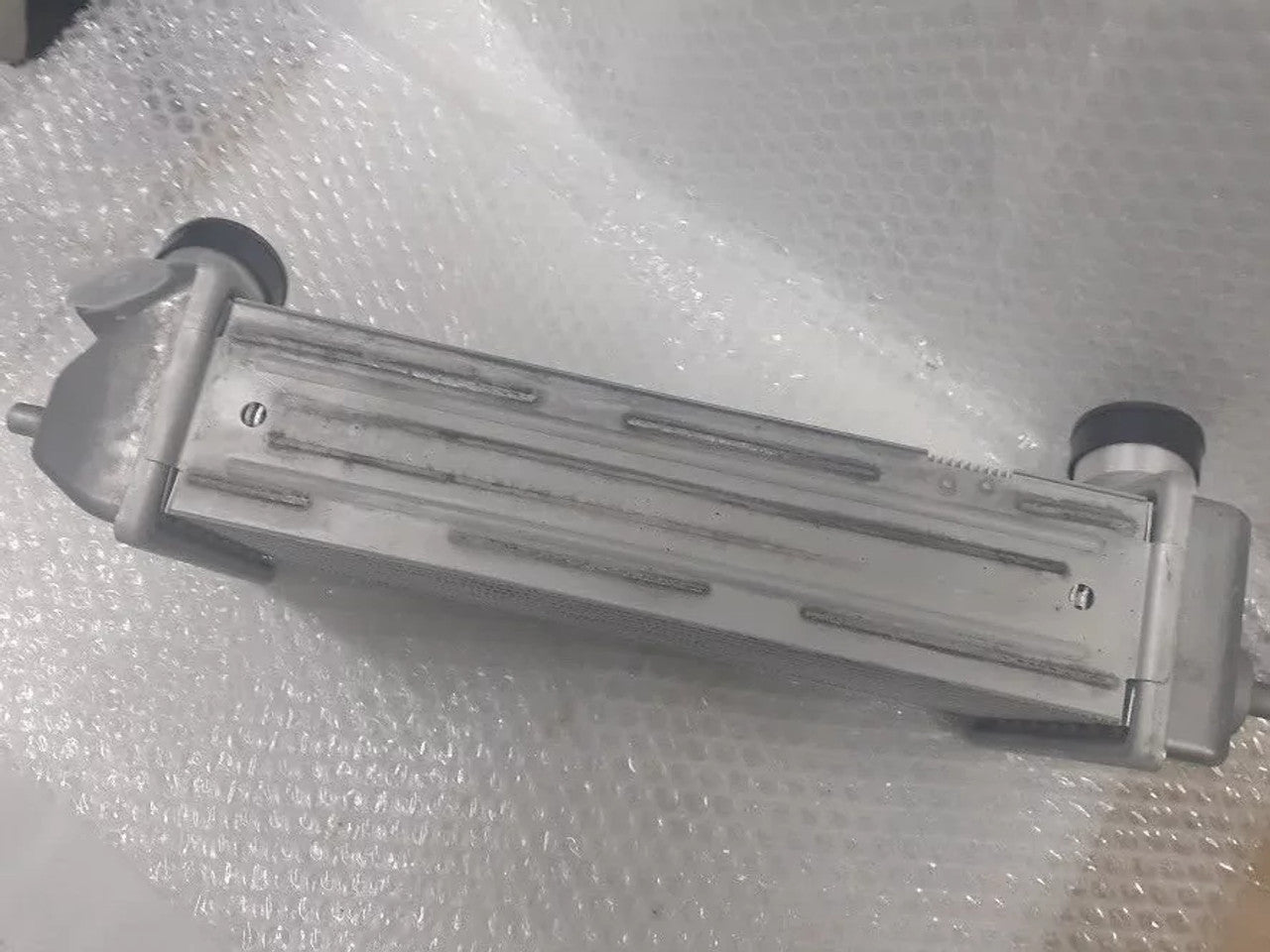 Intercooler fits Hyundai i20 ix200 Kia Soul Venga CRDi 282712A710 Genuine View Left