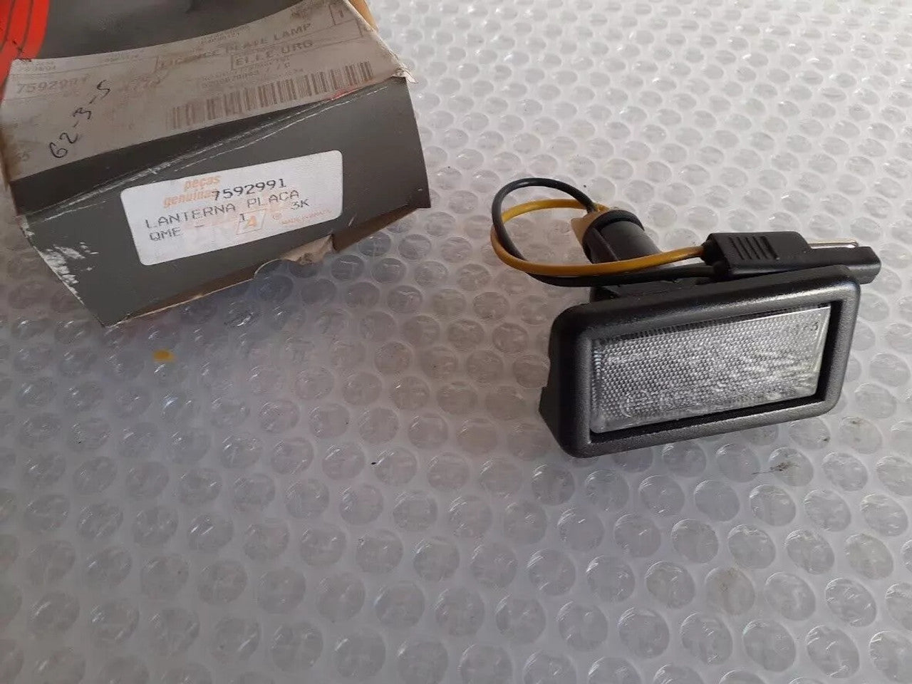 License Plate Light fits Fiat Fiorino 7592991 Genuine View Front