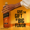 Indulge in the unmistakably big-tasting and vibrant Johnnie Walker Black Label Blended Scotch Whisky, full of flavor with the volume turned up. Each sip bursts with layers of smooth and delicious big flavors all proudly on show - creamy toffee, rich, sweet fruit and spicy vanilla, all perfectly wrapped in sweet smoke. 
Expertly crafted by the world's most experienced whisky makers, this blend brings together 29+ whiskies matured for at least 12 years to create the symphony of smooth and delicious flavors of Johnnie Walker Black Label. 
Johnnie Walker Black Label is an incredibly smooth balance of big flavors, where no matter how loud one note is, it never drowns another one out, making it a premium choice for any occasion. Includes one 80 proof 1.75L bottle of Black Label Blended Scotch Whisky. Please drink responsibly., One 1.75 L bottle of Johnnie Walker Black Label Blended Scotch Whisky, Indulge in the unmistakable taste of Johnnie Walker Black Label, a vibrant Blended Scotch Whisky that won Gold at the San Francisco World Spirits Competition in 2024, This award-winning Scotch Whisky is an impressive gift that captures the essence of smooth and smoky whiskies. The perfect gift for any tasting occasion, Only the finest Scotch Whiskies, aged for no less than 12 years, are 
carefully blended to achieve the perfect intensity and depth of flavor, With a perfectly balanced and distinctive flavor profile, Black Label is an excellent choice whether you prefer sipping it neat, mixing it in classic cocktails such as Whisky Sour, or creating refreshing-tasting highballs, One of the worldâ€™s best-selling deluxe Scotch whiskies, Layers of smooth and delicious big flavor await in every sip of Johnnie Walker Black Label, featuring creamy toffee, rich sweet fruits, and a touch of spicy vanilla, all wrapped in a sweet smoky finish