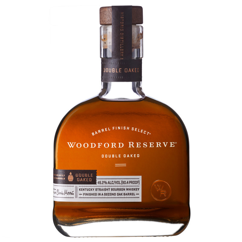Woodford Reserve Double Oaked Kentucky Straight Bourbon Whiskey is an innovative approach to twice-barreled bourbon, that showcases a rich and colorful flavor unlike any other Kentucky bourbon on the market. The process begins with Woodford Reserve Kentucky Straight Bourbon Whiskey, which is matured in handcrafted new white oak barrels. The whiskey is then matured again in a second bourbon barrel that is deeply toasted before a light charring to extract additional soft, sweet oak character. These whiskey bottles contain a deep amber liquor with rich notes of dark fruit, caramel, sharp honey, chocolate and toasted oak. Each sip of this Woodford Reserve bourbon offers a full-bodied mix of vanilla, dark caramel, hazelnut and spice flavors, followed by a long and creamy finish with lingering hints of honeyed apple. Try this Kentucky bourbon whiskey in mixed drinks and cocktails, like a Double Oaked Old Fashioned or Whiskey Sour, or simply enjoy it neat in your favorite whiskey glass. Crafted Carefully. Drink Responsibly.