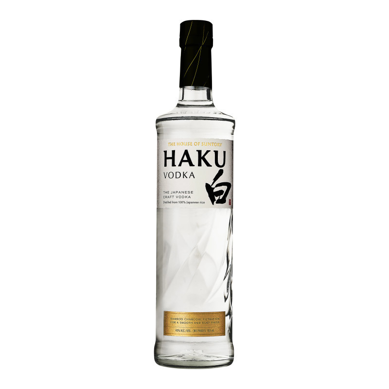 Haku is the Japanese craft vodka from the House of Suntory. The name Haku means "white" in Japanese and refers to the Japanese white rice that is the origin of the liquid. Moreover, it can also be read as "brilliant" -- a tribute to the craft of mastering a clear, clean, and luminous vodka. Suntory has been making vodka since 1956, and Haku represents Suntory's philosophy of craftsmanship, meticulous attention to detail, and commitment to quality. Haku is made with 100% Japanese white rice. It has 3 distinct steps in the distillation process. First, Japanese rice is fermented and distilled through a pot still to create a rice spirit in Kagoshima, Japan. Then, the rice spirit is distilled a second time through 2 different processes in a pot still and column still to create a uniquely flavored liquid. Finally, the liquid is blended and then filtered through bamboo charcoal in Osaka, Japan. The resulting liquid's taste profile is clean, soft, and smooth with a sweet rice flavor.
