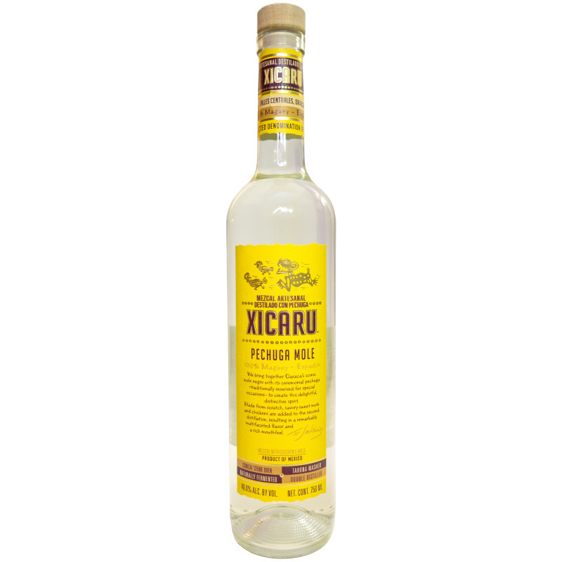 XICARU MEZCAL. RESPECT FOR TRADITION Xicaru, (pronounced Zee-kah-roo and is the Zapotec word for beautiful), reflects Fernando Santibañez’s desire to share a traditionally produced mezcal that is approachable and distinct. Using his grandmother’s recipe, we make small batches of Xicaru Mezcal with time-honored methods at a palenque in Matatlán, Oaxaca. Xicaru is made from 100% Maguey espadin, harvested at approximately eight years maturity. Its natural smoky flavor is derived from cooking the maguey in an underground conical stone oven on mesquite and ocote, woods native to Oaxaca. The cooked maguey is mashed by horse-drawn tahona, fermented naturally in open-air pine vats and double-distilled in small copper alembics. In ancient Zapotec culture, the jaguar symbolized great strength and agility. Each type of Xicaru Mezcal is emblazoned with a unique jaguar that reflects its special characteristics and the tradition and heritage used to craft Xicaru Mezcal.