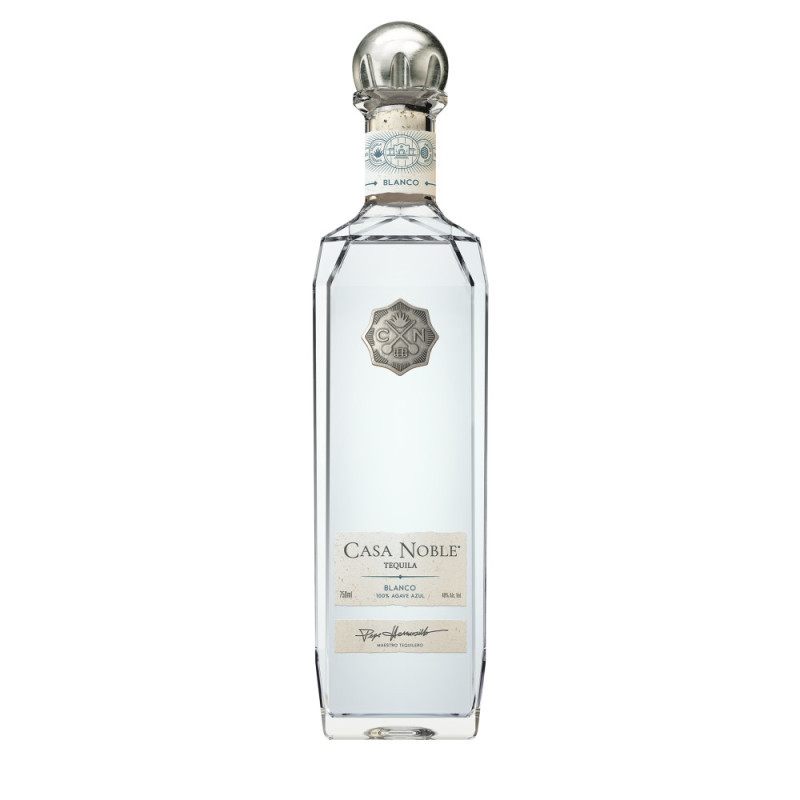 Casa Noble Blanco Tequila is the embodiment of tequila liquor in its most vibrant, unaged form. This Mexican tequila is made with a dedication to quality and sustainability, using only the finest ingredients, including 100% CCOF Certified Organic blue agave grown in the rich, volcanic soil of Jalisco. Masterful harvesting and slow-cooking in stone ovens, along with a proprietary juice-extraction method, produce a 100% blue weber agave tequila that is smooth, complex, and elegantly balanced. This blanco tequila then is triple-distilled, resulting in an unrivaled spirit perfect for sipping. The rich, sweet, smoky aromas of this Casa Noble tequila are complemented by a sweeter agave presence with softer herbal notes and enhanced fruit and citrus notes, making it perfect for savoring in your favorite tequila sipping glasses. Even the most discerning consumers will enjoy this award-winning tequila blanco, either on its own or in margaritas and other tequila cocktails. Be Noble. Drink Responsibly.  2025Casa Noble Imports, Canandaigua, NY. Tequila. 40% alc. by vol.