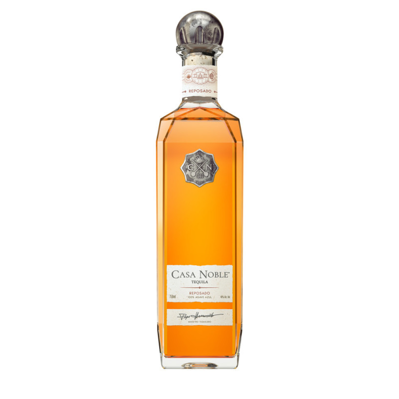 Casa Noble Reposado Tequila is a consistently smooth agave tequila with remarkable character and elegance. This Mexican tequila is made with a dedication to quality and sustainability, using only the finest ingredients, including 100% CCOF Certified Organic blue agave grown in the rich, volcanic soil of Jalisco. Masterful harvesting and slow-cooking in stone ovens, along with a proprietary juice-extraction method, produce a 100% blue weber agave tequila that is smooth, complex, and elegantly balanced. The blanco tequila then is triple-distilled and aged for 364 days in new French oak barrels sourced from the most respected cooperages, including oak from Taransaud in Cognac and Nadalie in Bordeaux. The result is an aged Casa Noble tequila with a wide variety of floral, spiced, toasted, and fruit notes that harmonize beautifully with the agave, making it perfect for savoring in your favorite tequila sipping glasses. Even the most discerning consumers will enjoy this unique, sensuous, and full-bodied tequila reposado, either on its own or in margaritas and other tequila cocktails. Be Noble. Drink Responsibly.  2025Casa Noble Imports, Canandaigua, NY. Tequila. 40% alc. by vol.