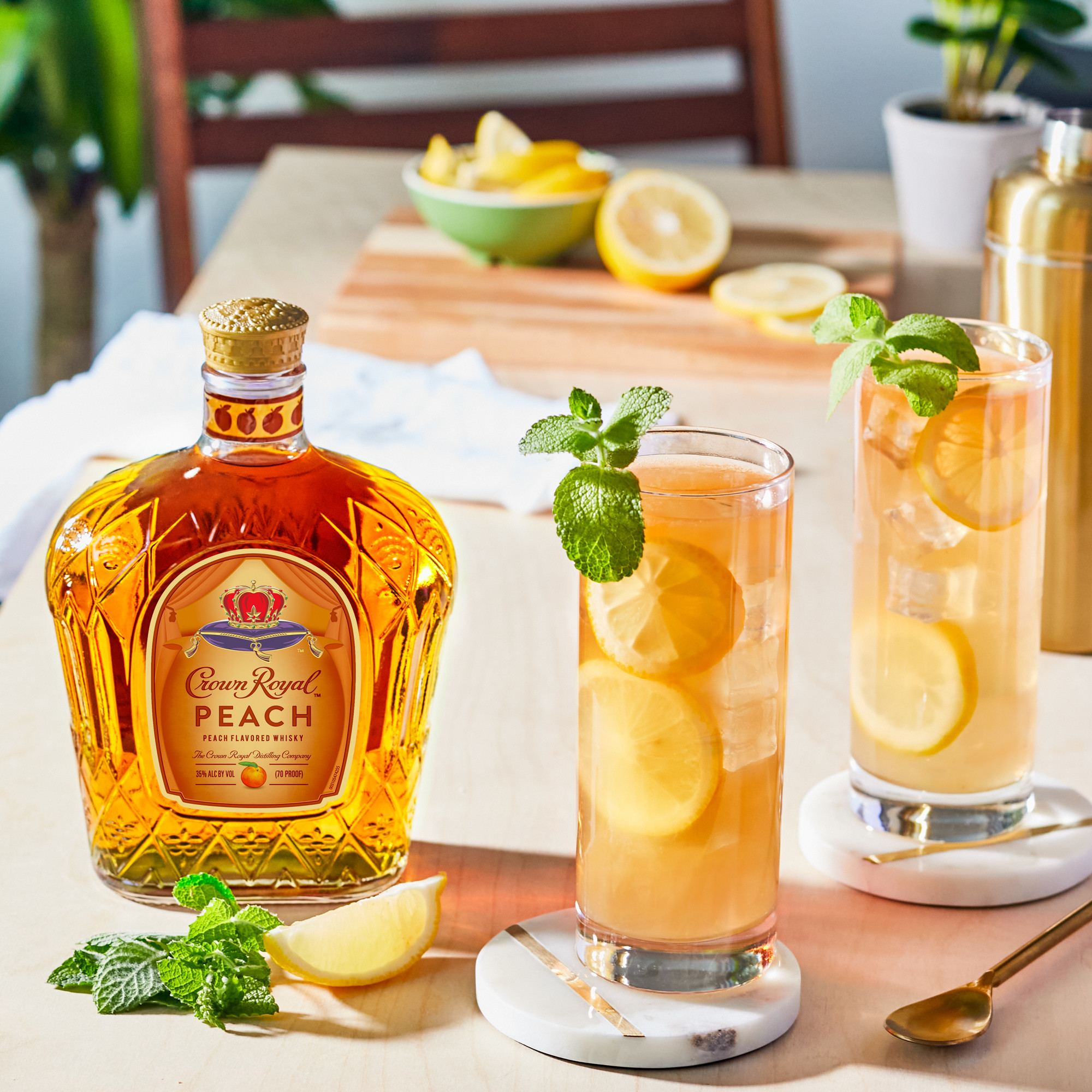 Unwind in luxury with a glass of Crown Royal Peach Flavored Whisky. To create this extraordinary blend, fresh Georgia peaches are harvested, de-stoned, pressed and strained to preserve their bright, aromatic taste. Then, our master blender infuses the juicy flavor for a vibrant and delicious whisky with luscious notes of creamy vanilla and a decadently sweet finish. Made with the signature smoothness of traditional Crown Royal, our peach flavored whisky will enhance a cozy cocktail party or rooftop celebration. Perfect for a Royal Peach Fizz cocktail. Includes one 70 proof 1 L bottle of Crown Royal Peach Flavored Whisky. Please drink responsibly., One 1 L bottle of Crown Royal Peach Flavored Whisky, Perfect for kicking off spring and summer parties, Meticulously blended with 50 distinct and rich whiskies, Infused with the juicy flavor of fresh Georgia peaches, Sweet and smooth finish