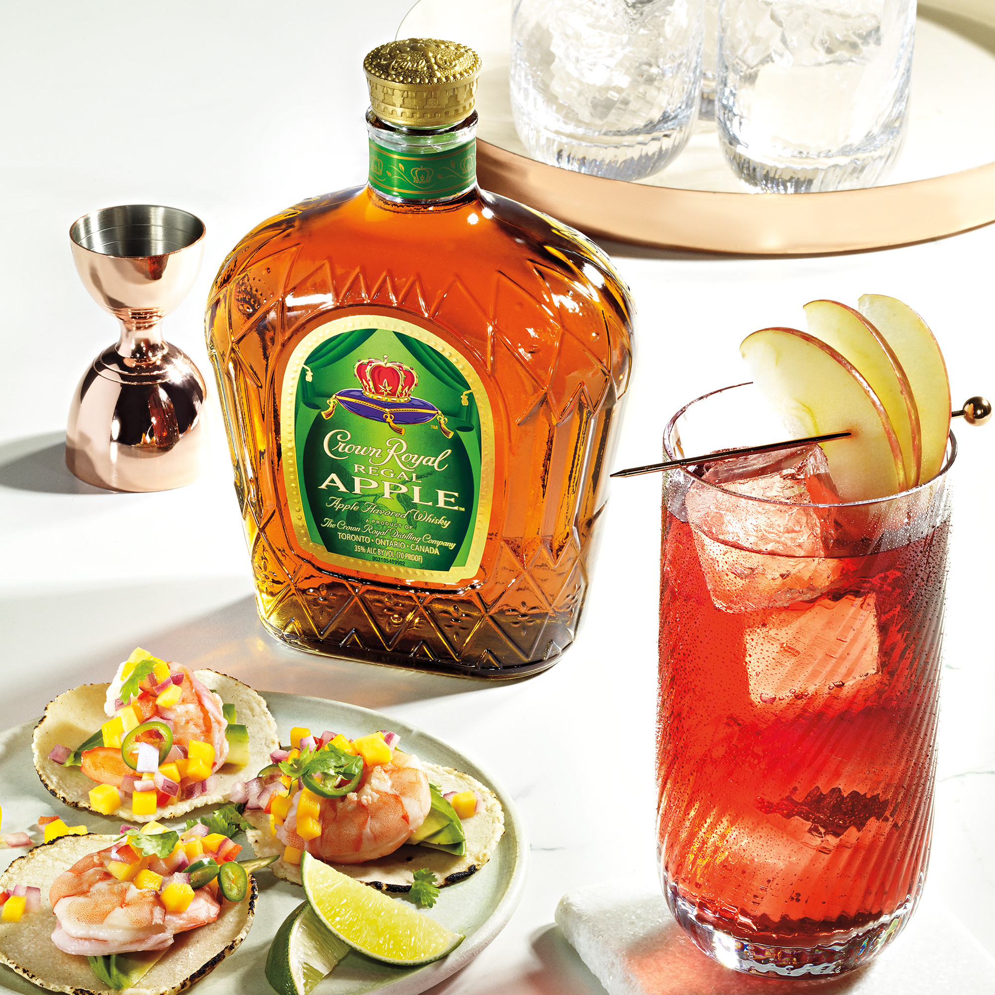 Unwind in luxury with a glass of Crown Royal Regal Apple Flavored Whisky. Infused with regal gala apples and hints of caramel and spice, our 70 proof whisky provides a refined, crisp taste. Made with the signature smoothness of traditional Crown Royal and matured to perfection, our apple flavored whisky will enhance any cocktail party or celebration. Perfect for a Crownberry Apple cocktail. Includes one 70 proof 375 mL bottle of Regal Apple Flavored Whisky. Please drink responsibly., One 375 mL bottle of Crown Royal Regal Apple Flavored Whisky, Perfect as a gift or for any celebration, Meticulously blended with 50 distinct and rich whiskies, Infused with Regal Gala Apples for a crisp, refined flavor, Robust, full-bodied blend of 50 rare Canadian whiskies, Matured to perfection