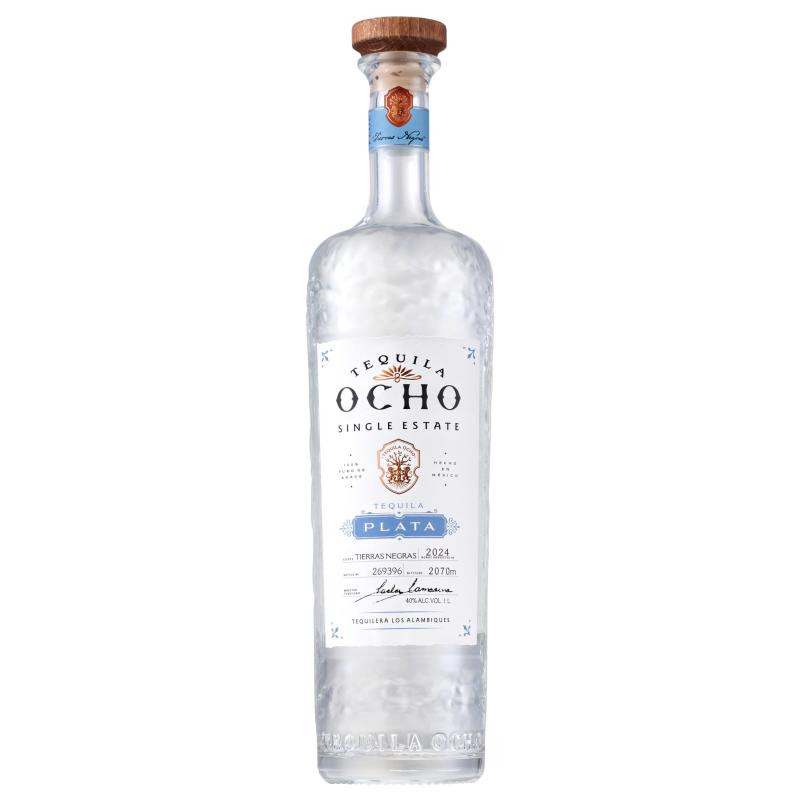 Explore the agave-forward Tequila Ocho Plata, the world's first single-estate, single-field tequila that expresses the purest agave flavor. Made using traditional, sustainable, additive-free methods that celebrate the terroir of its Jalisco highlands home, this tequila was founded by tequila expert and restaurateur Tomas Estes and third-generation Master Distiller Carlos Camarena. Tequila Ocho Plata is made from the finest, overripe agaves and slow-cooked in stone ovens, the artisanally old-fashioned way. This tequila features full and complex agave notes along with crisp, bright aromas of lively citrus, and a long, harmonious finish. Whether enjoyed neat, on the rocks or in signature craft cocktails, such as a paloma, this tequila blanco offers a unique flavor. The award-winning liquor was named "Best Blanco Tequila" at the San Francisco World Spirits Competition in 2022. The 1L bottle of tequila has 40% alcohol by volume and should be enjoyed responsibly.