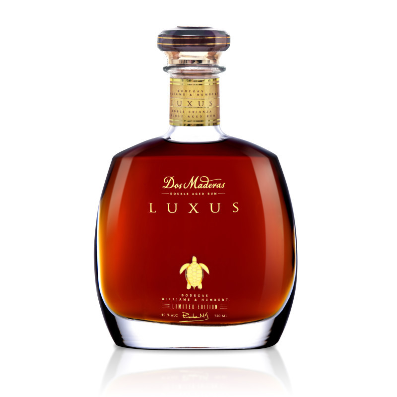 Dos Maderas Luxus is a luxurious rum with a striking, rich color and intense aroma. It undergoes a unique two-step aging process, resting for ten years in the Caribbean and then aged for an additional five years in Spain.