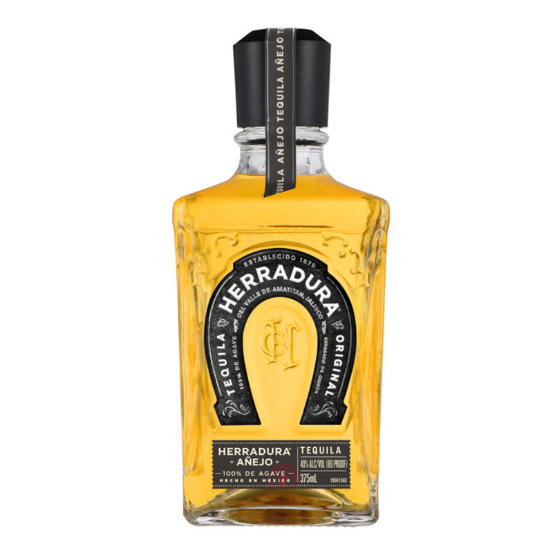Tequila Herradura Añejo is aged to perfection for 25 months in American white oak barrels, which is an incredible 13 months beyond industry standards to create a tequila with a remarkably smooth taste. This process results in a dark amber-colored tequila liquor with aromas of cooked agave blended with spice and floral notes. Each tequila bottle delivers notes of cooked agave, toasted oak and dried fruit that melt across your tongue with a smooth, creamy finish. Tequila Herradura Añejo is perfect for sipping neat, on the rocks or mixing into delicious mixed drinks and cocktails, such as a Horseshoe Margarita or a Classic Paloma. Enjoy an alcohol drink of Tequila Herradura Añejo with steak or mushroom dishes or rich chocolate desserts. Please Enjoy Responsibly.