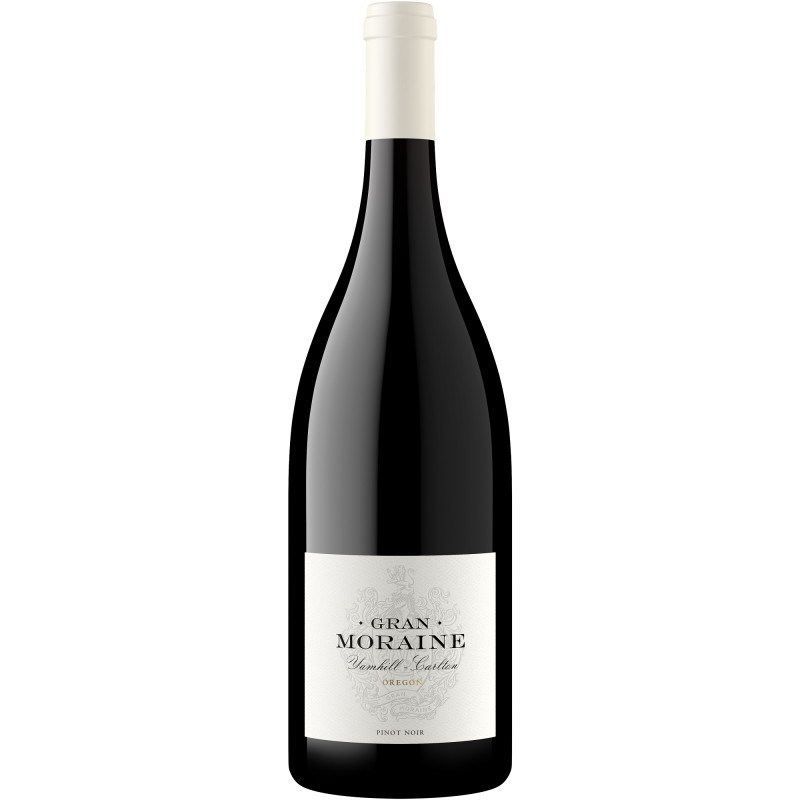 The Gran Moraine Yamhill-Carlton Pinot Noir red wine is a true expression of Oregon terroir, offering elegance, restraint, and through-line acidity.

This red wine offers aromas of dark cherries, antique rose and earth. The palate opens with notes of red fruit and mineral, accentuated by firm acidity and a generous mid-palate.

This Red Wine has a Cork closure.

Alcohol Content: 13.8%

Pair with duck rillette, bone-in pork chop, morel risotto or roasted salmon.

Our Pinot Noir was crafted from the fruit grown on both our Gran Moraine Vineyard and our Winery Estate Vineyard. Both sites are located in the Yamhill-Carlton AVA and contain some of the oldest marine sedimentary based soils in the Willamette Valley, producing wines with nuanced fruit and earth characteristics. The fruit was picked at a point to best express the profoundness of the site and the vintage. At the winery, the fruit was held overnight in our cold room to chill at 42 degrees Fahrenheit before being carefully hand-sorted and gravity fed into open top tanks. Approximately 25% of the fruit was left intact for whole cluster fermentation, then aged for 9 months in 39% new French oak.