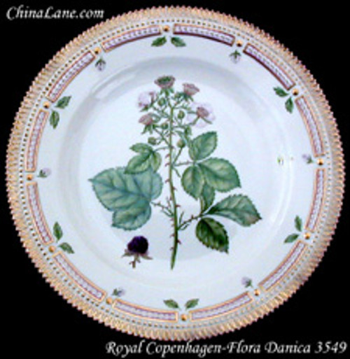 Royal Copenhagen Flora Danica Dinner Plate, 10". and-painted botanical motif and gilded molded rim.