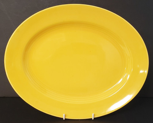 Homer Laughlin Harlequin Yellow Platter 13" 13". Collectible replacement piece available at China Lane.