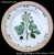 Royal Copenhagen Flora Danica Dinner Plate, 10". and-painted botanical motif and gilded molded rim.