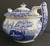 Spode Blue Italian newer teapot porcelain 4 cup capacity with floral scrollwork border and blue countryside scene